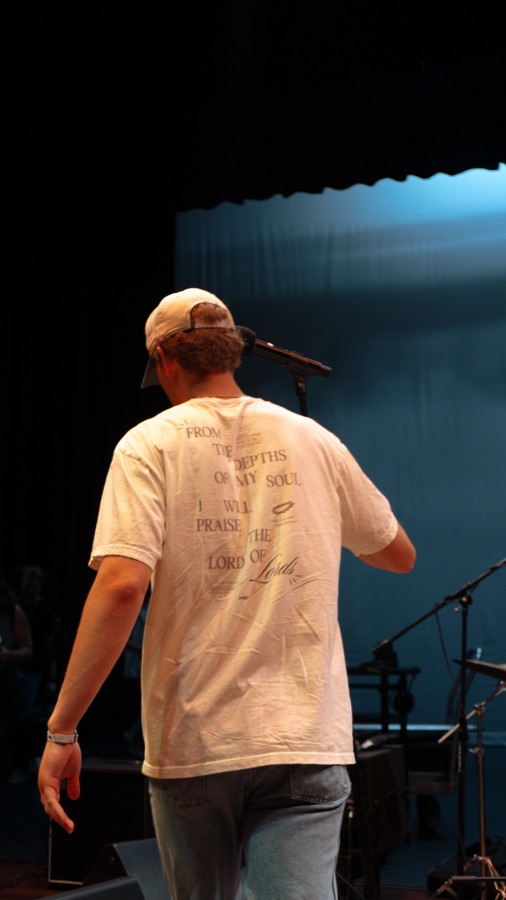 Worship leader singing at Higherways Worship